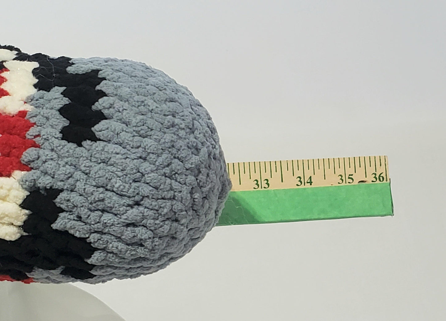 J12 - Crochet Joint / Doobie, White 100% polyester soft blanket yarn, has safety eyes, approx. 28"x 5", 1 lb., 12 oz