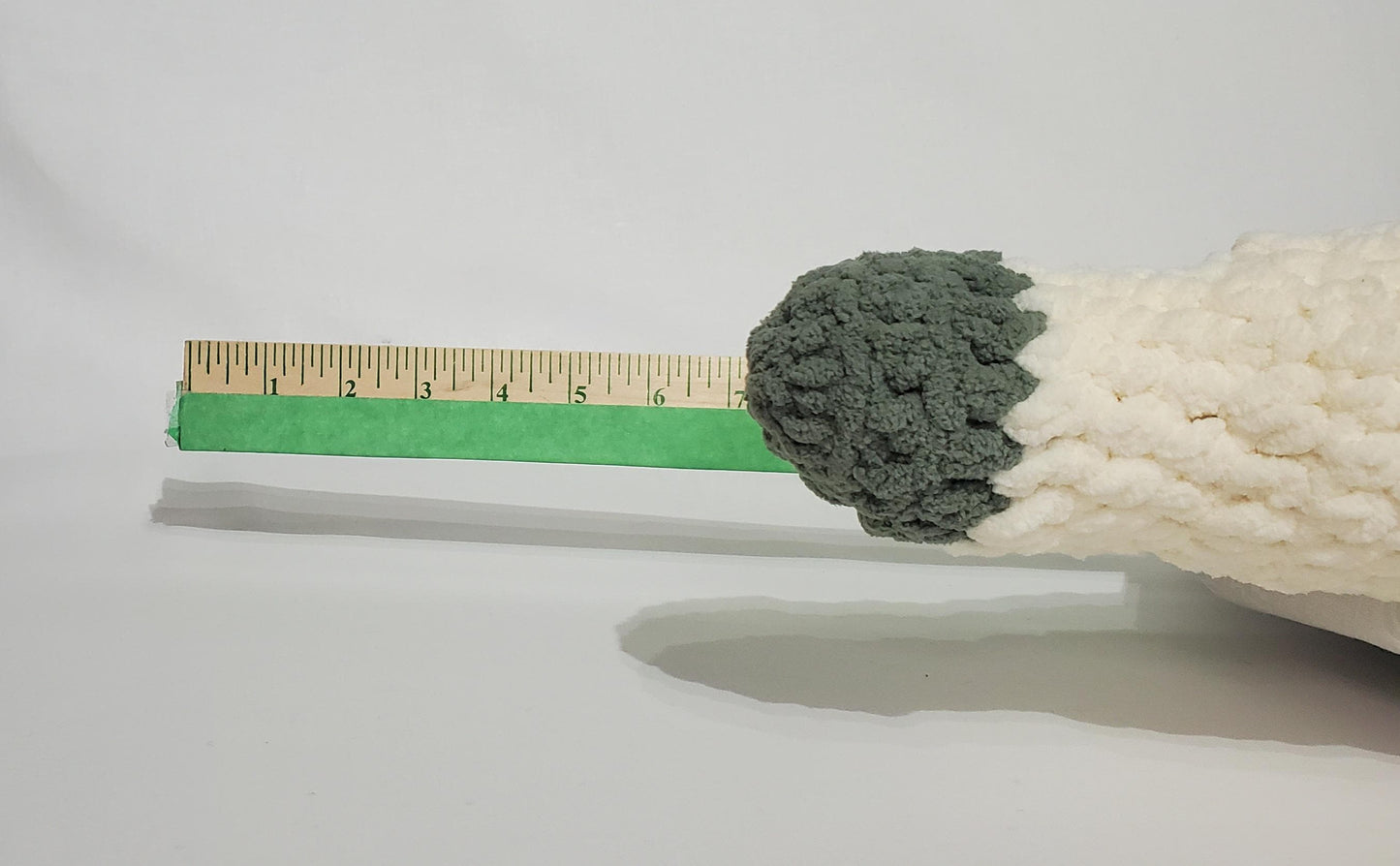 J11 - Crochet Joint / Doobie, White 100% polyester soft blanket yarn, has safety eyes, approx. 26"x 5", 13 oz
