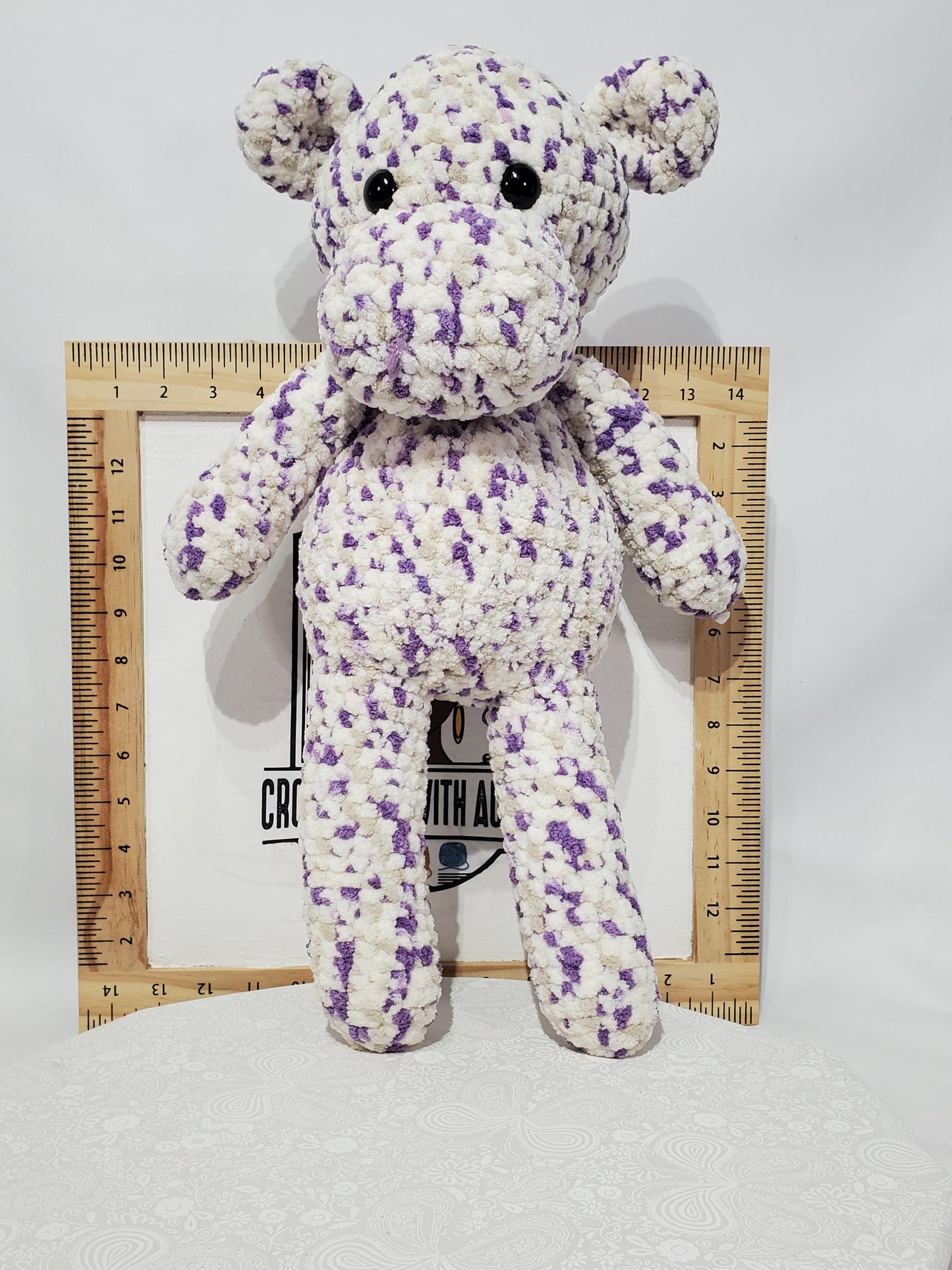 T15: Crochet Hippo, made with soft blanket yarn (100% polyester), fiber fill, and plastic safety eyes, approx. 19" x 10"
