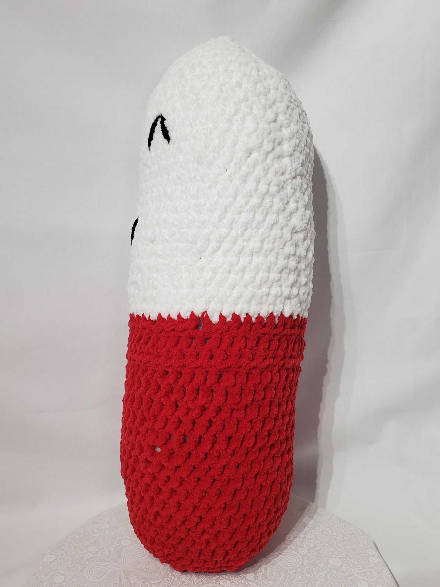 Crochet chill Pill Stuffy /Pillow, Red and White, made with soft blanket yarn (100% polyester), and fiber fill, approx. 23”x8”