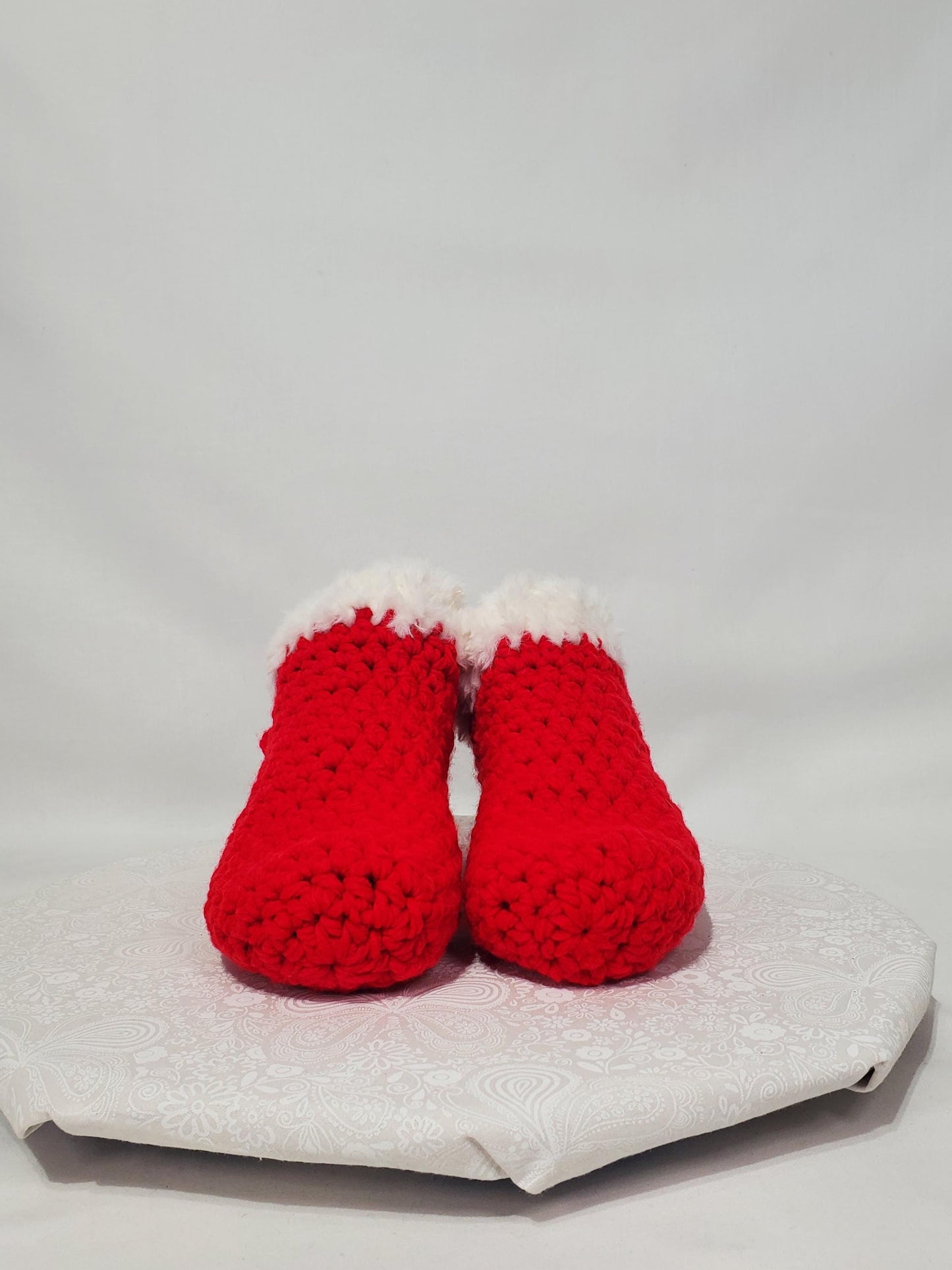Item S2: Red slippers with white fur, made with 100% acrylic chunky yarn, Women's size 5/6