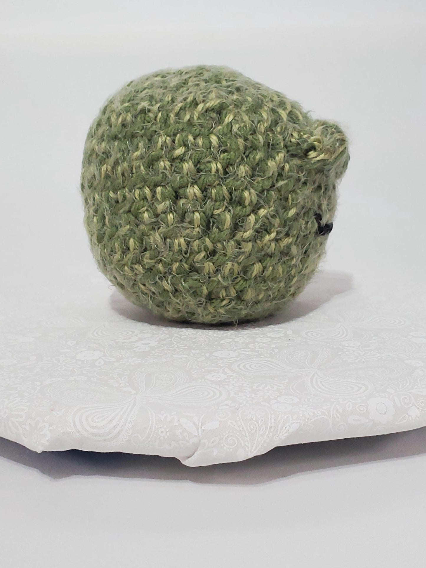 N7: Crochet 420 Nugget made with acrylic and polyester yarn, safety eyes and polyester fiber fill, approx. 6x6, approx. 10 oz.