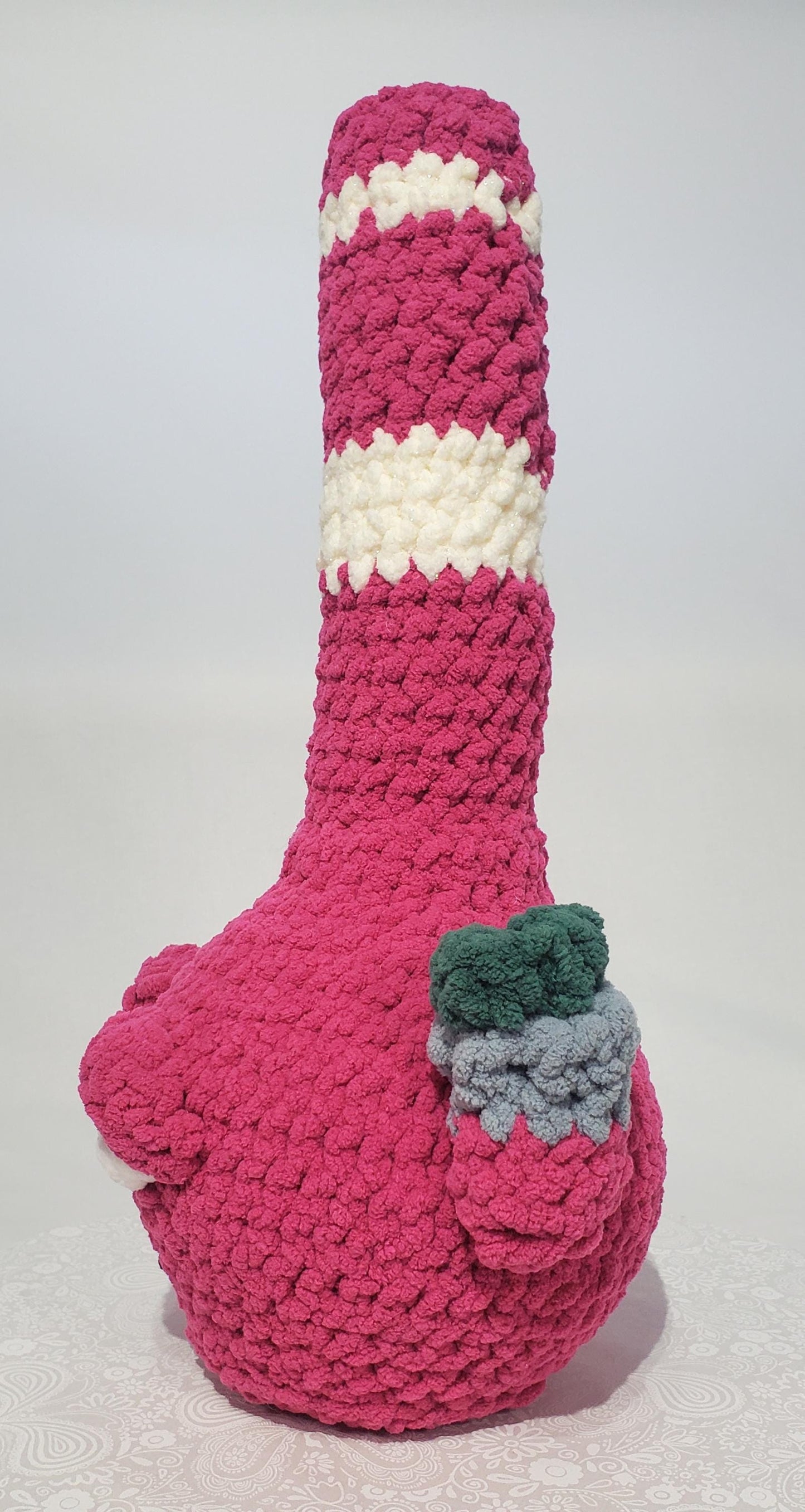 B8: Crochet Bong, Pink and white, made with 100% polyester, soft blanket yarn, and safety eyes, approx. 16" x 7", 13 oz