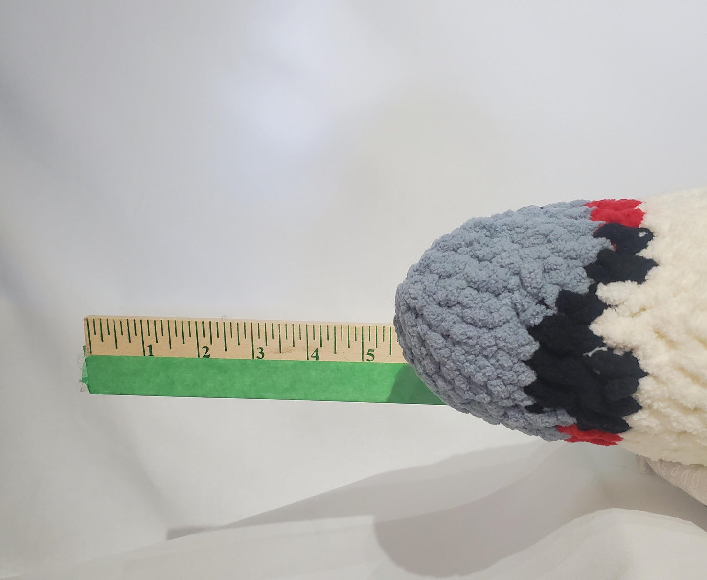 J9 - Crochet Joint / Doobie, White 100% polyester soft blanket yarn, has safety eyes, approx. 22"x 4"