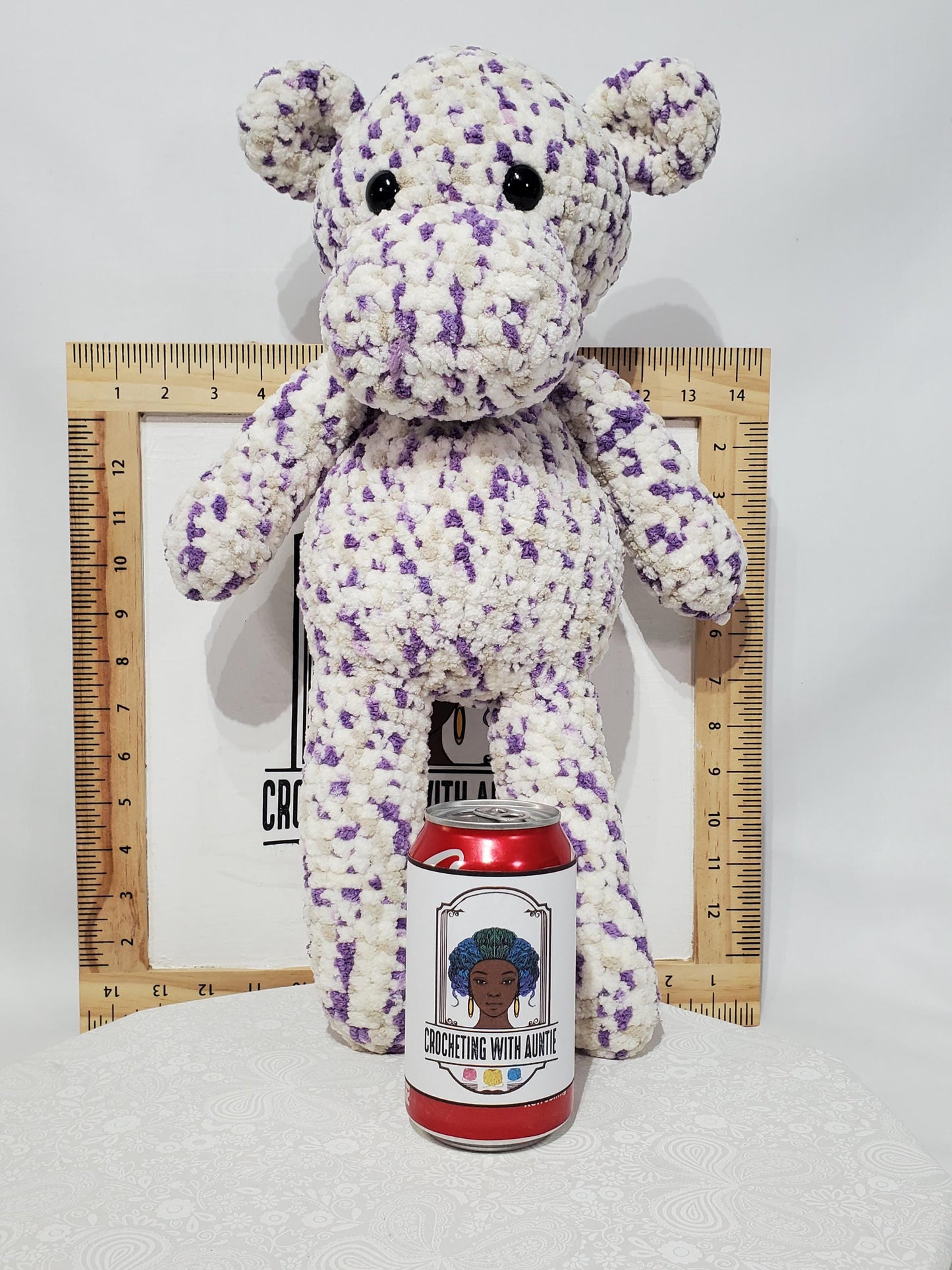 T15: Crochet Hippo, made with soft blanket yarn (100% polyester), fiber fill, and plastic safety eyes, approx. 19" x 10"