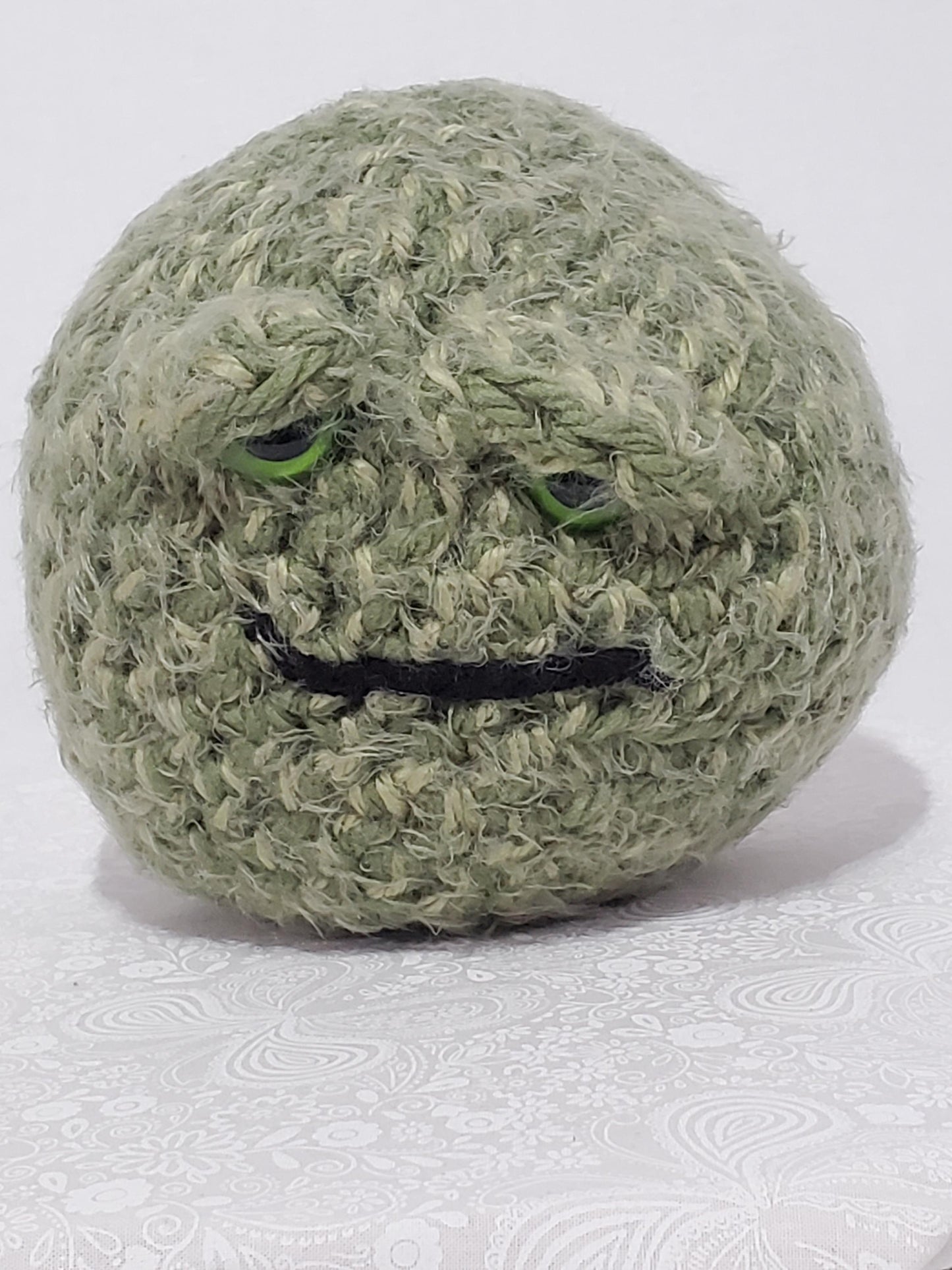 N7: Crochet 420 Nugget made with acrylic and polyester yarn, safety eyes and polyester fiber fill, approx. 6x6, approx. 10 oz.