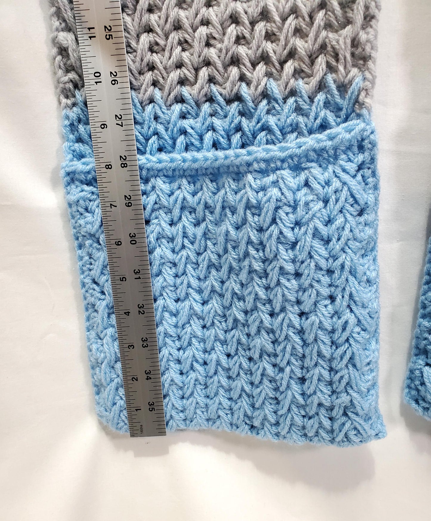 DL1: Detroit Lions Inspired Scarf with Pockets, 7 ft long, 8 in wide, pockets 8 in deep, warm and thick, made with 100% acrylic yarn.