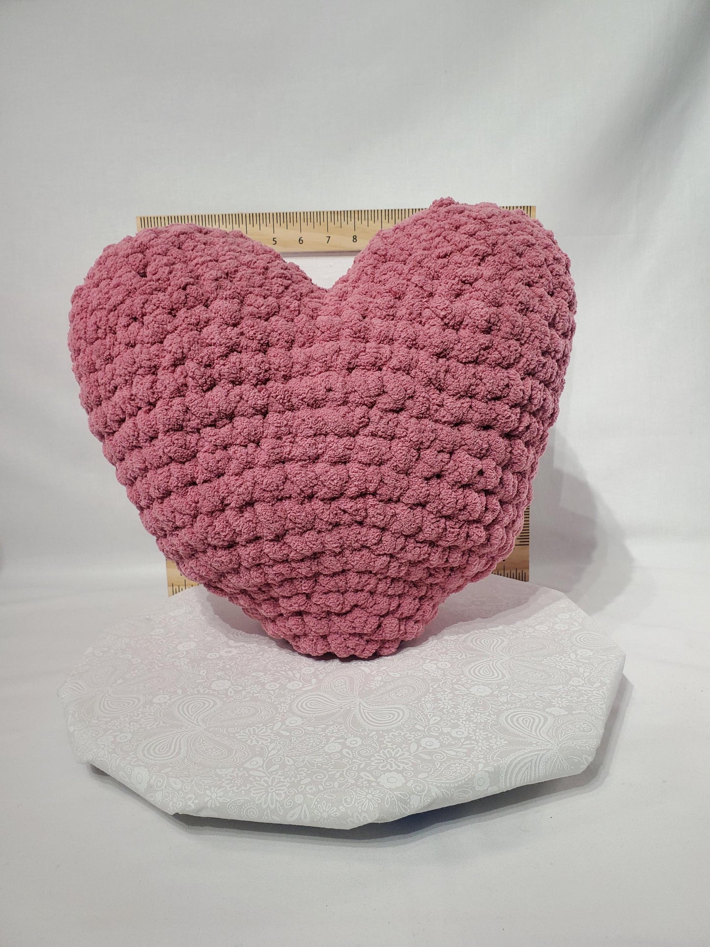 T29: Crochet Heart Pillow / Stuffy, mauve / pink, made with soft blanket yarn (100% polyester) and safety eyes, approx. 14" x 13", 1 lb