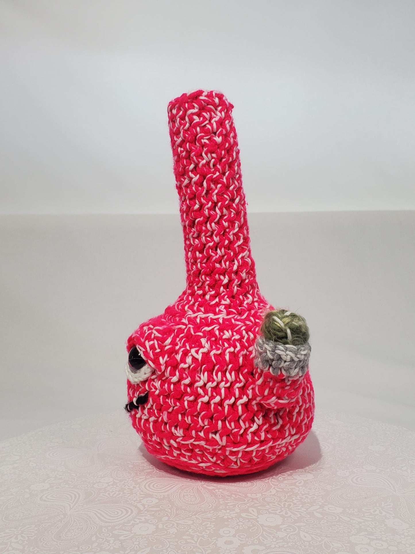 B1: Crochet Bong, Pink and White - GLOWS IN DARK, made with acrylic and cotton yarn, has safety eyes, approx. 10" x 5", 8 oz