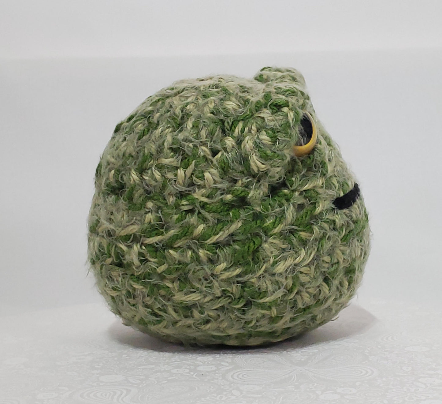N6: Crochet 420 Nugget made with acrylic and polyester yarn, safety eyes and polyester fiber fill, approx. 7x7, approx. 10 oz.