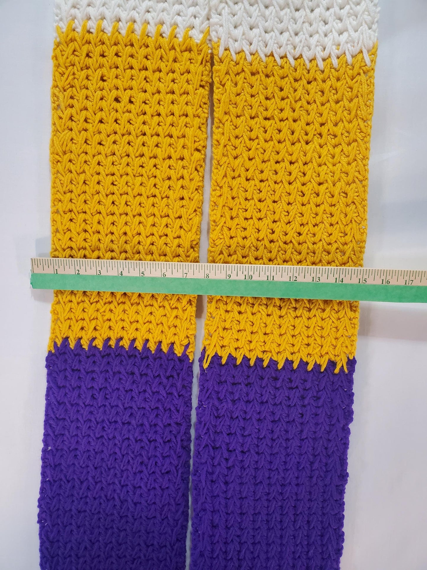 V5: MN Vikings Inspired Scarf with Pockets, 8' long, 7" wide, pockets 9" deep, thick and warm, made with 100% acrylic yarn.