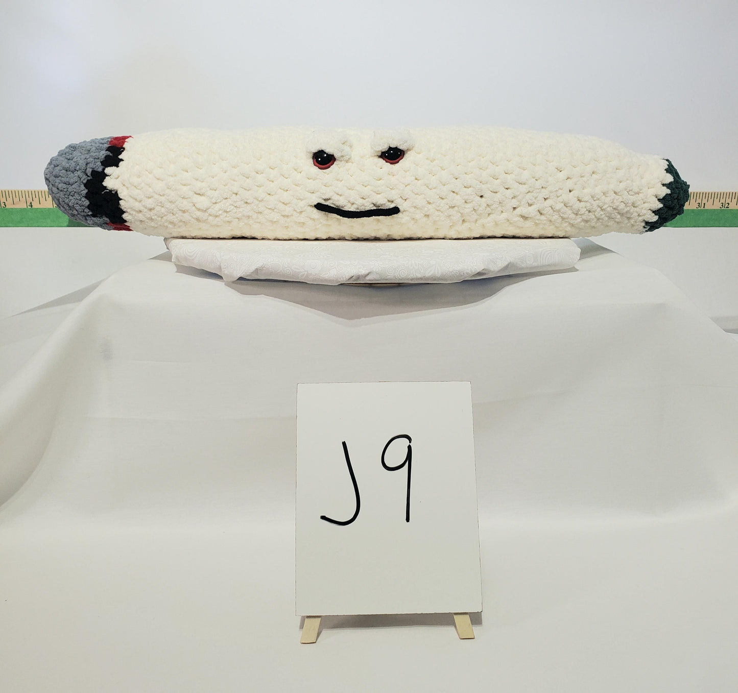 J9 - Crochet Joint / Doobie, White 100% polyester soft blanket yarn, has safety eyes, approx. 22"x 4"