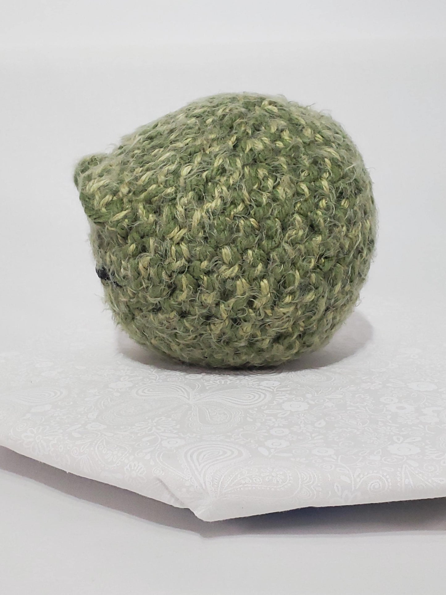 N7: Crochet 420 Nugget made with acrylic and polyester yarn, safety eyes and polyester fiber fill, approx. 6x6, approx. 10 oz.