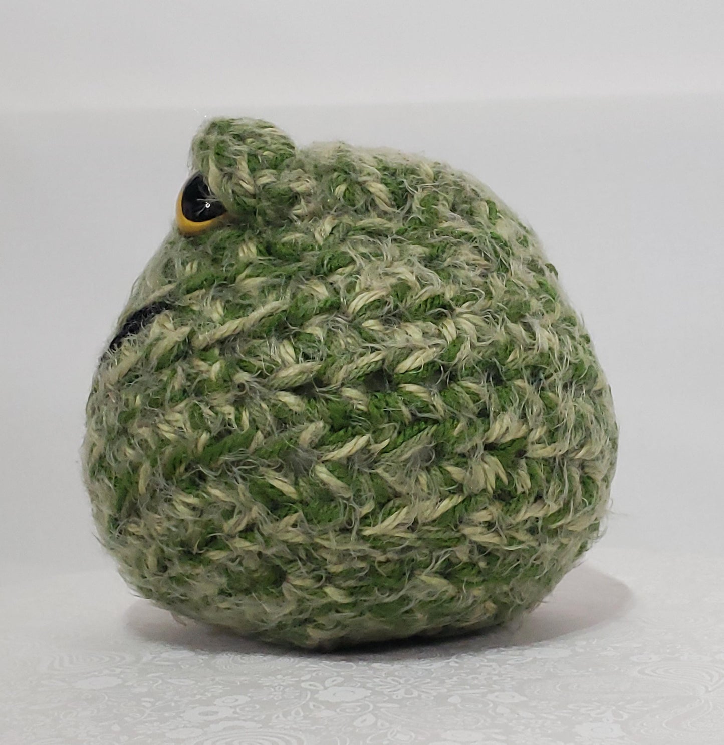 N6: Crochet 420 Nugget made with acrylic and polyester yarn, safety eyes and polyester fiber fill, approx. 7x7, approx. 10 oz.