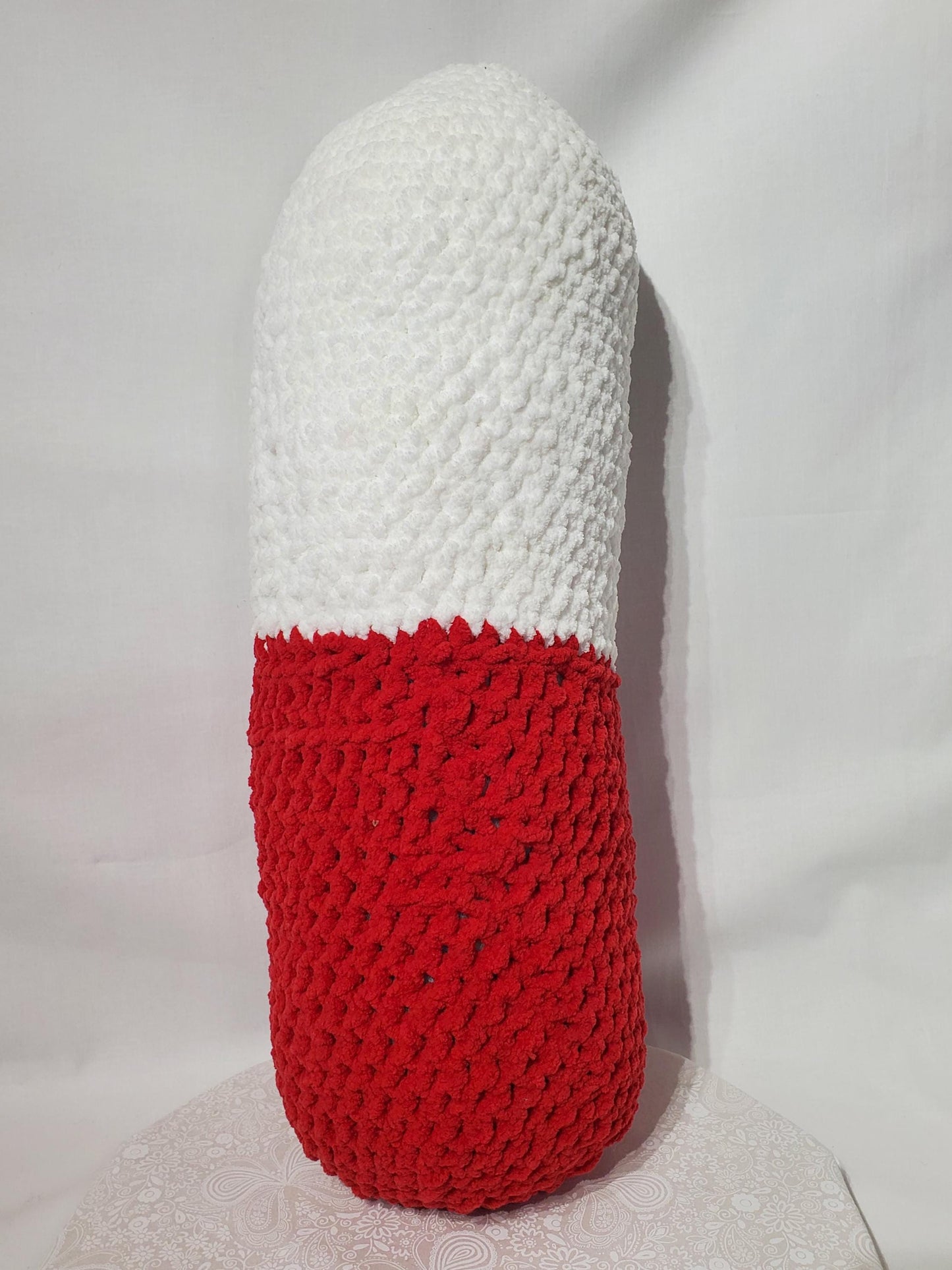 Crochet chill Pill Stuffy /Pillow, Red and White, made with soft blanket yarn (100% polyester), and fiber fill, approx. 23”x8”