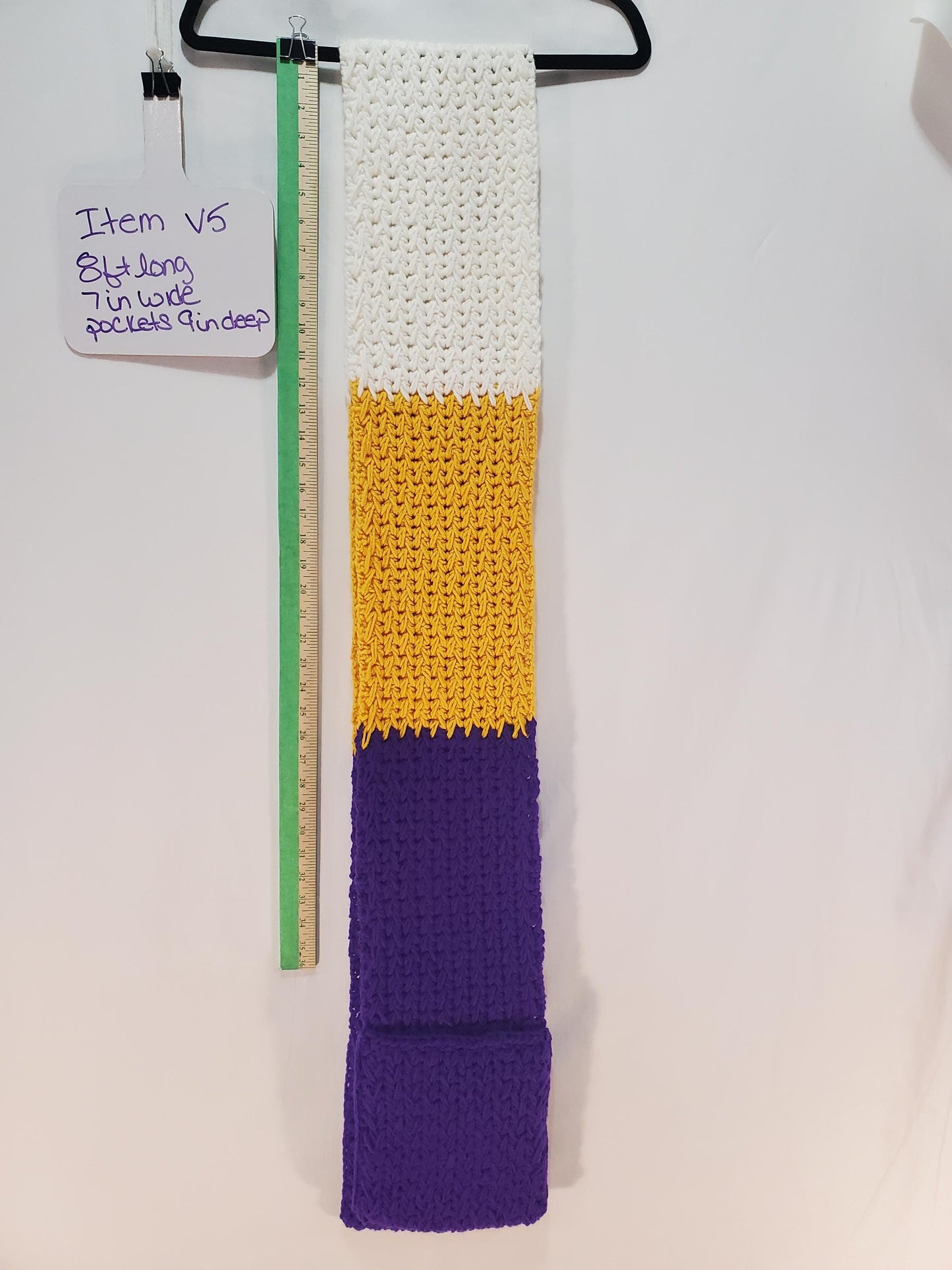V5: MN Vikings Inspired Scarf with Pockets, 8' long, 7" wide, pockets 9" deep, thick and warm, made with 100% acrylic yarn.
