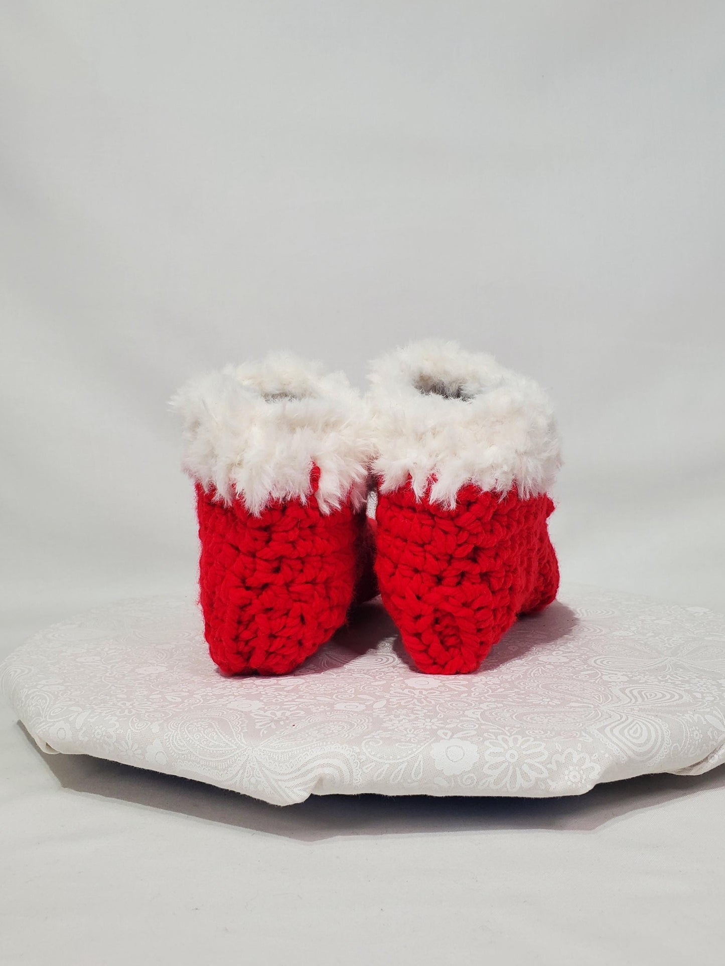 Item S2: Red slippers with white fur, made with 100% acrylic chunky yarn, Women's size 5/6