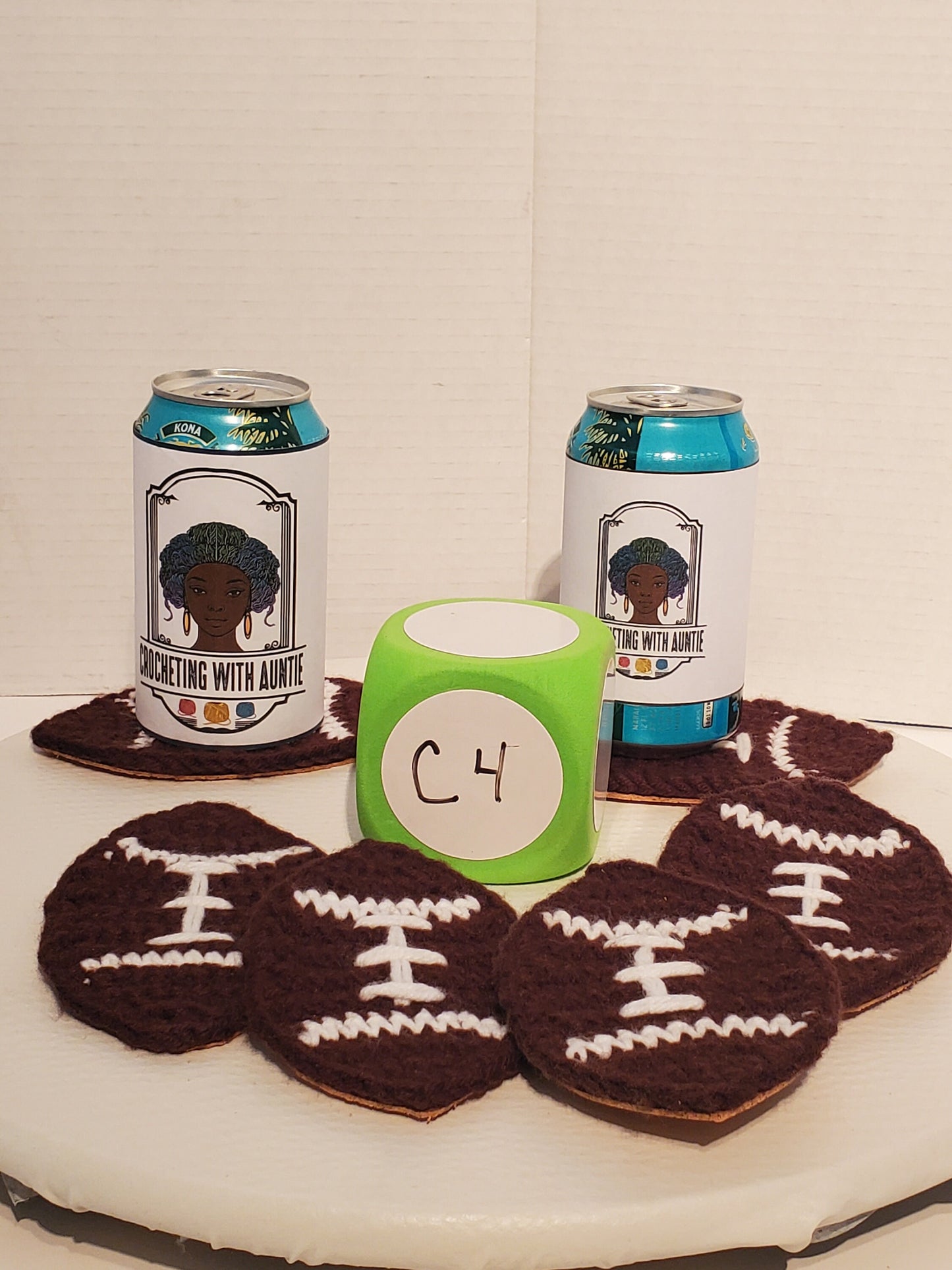 Item C4: Crochet Football Coasters with Cork backing, made with acrylic yarn, set of 6