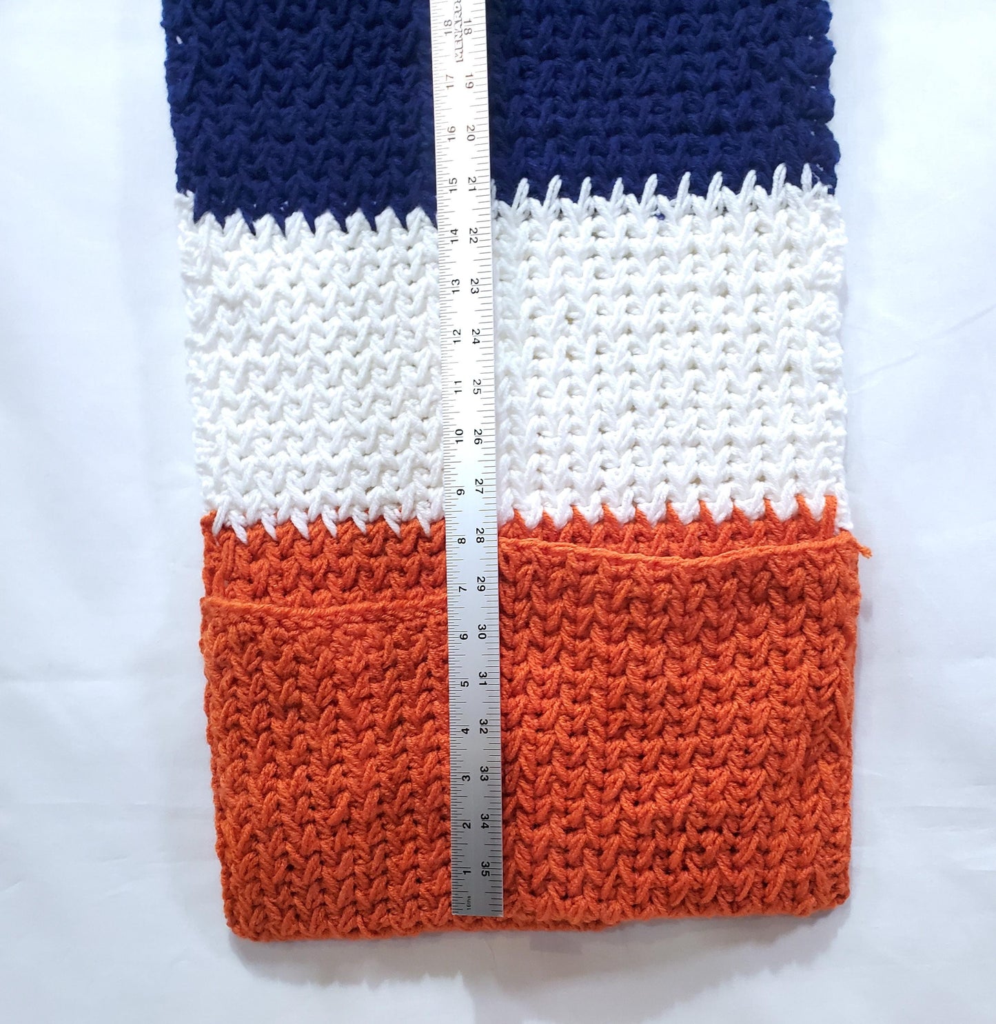 CB1: Chicago Bears Inspired Scarf with Pockets, 6 1/2 ft long, 8 in wide, pockets 8 in deep, warm and thick, made with 100% acrylic yarn.