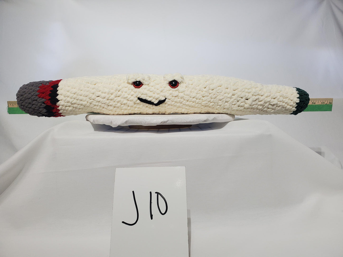 J10 - Crochet Joint / Doobie, White 100% polyester soft blanket yarn, has safety eyes, approx. 30"x 4", 14 oz