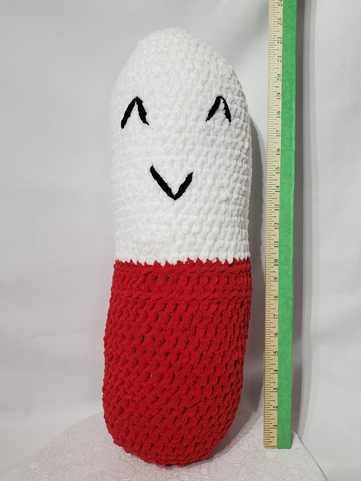 Crochet chill Pill Stuffy /Pillow, Red and White, made with soft blanket yarn (100% polyester), and fiber fill, approx. 23”x8”