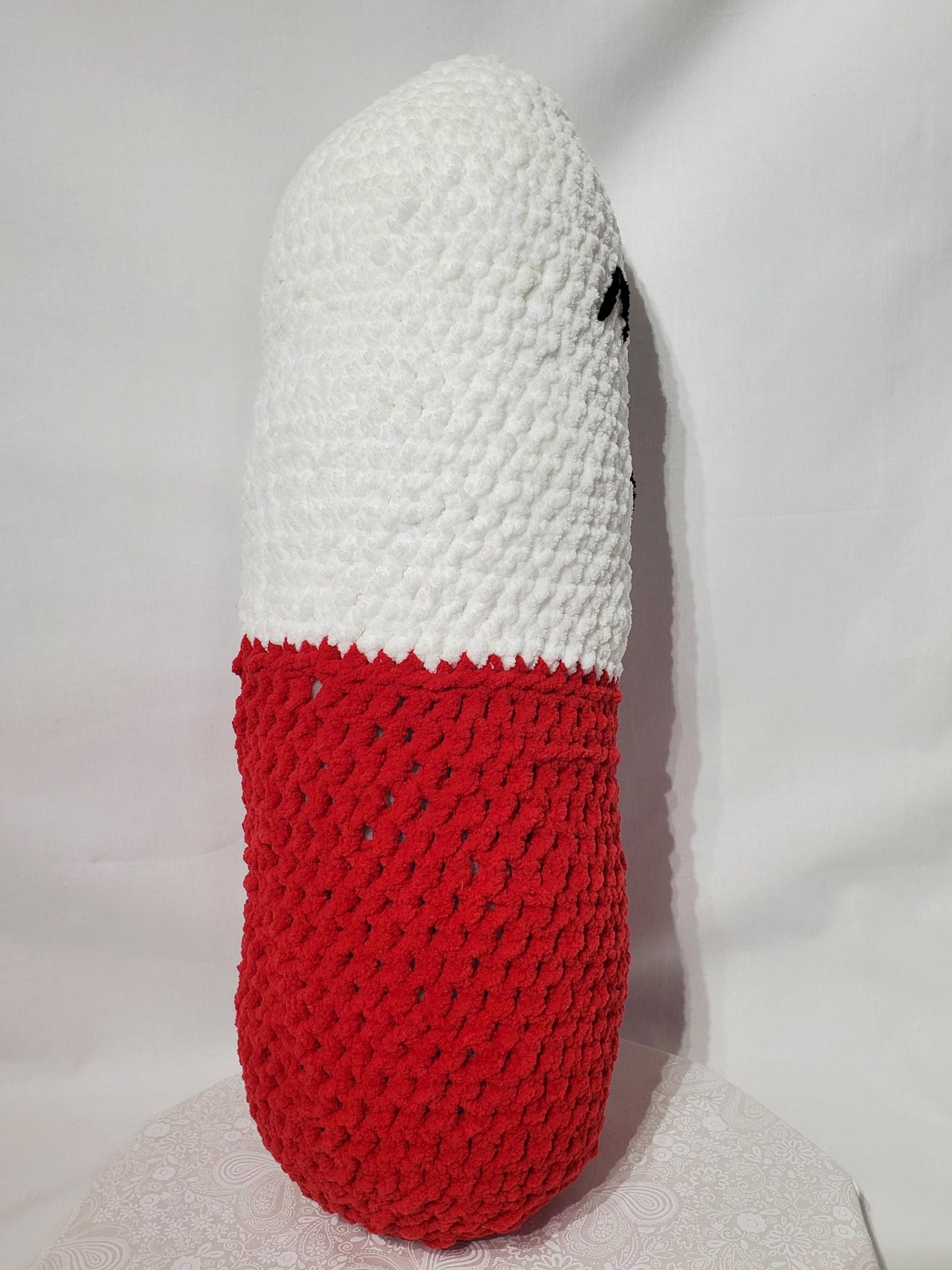 Crochet chill Pill Stuffy /Pillow, Red and White, made with soft blanket yarn (100% polyester), and fiber fill, approx. 23”x8”