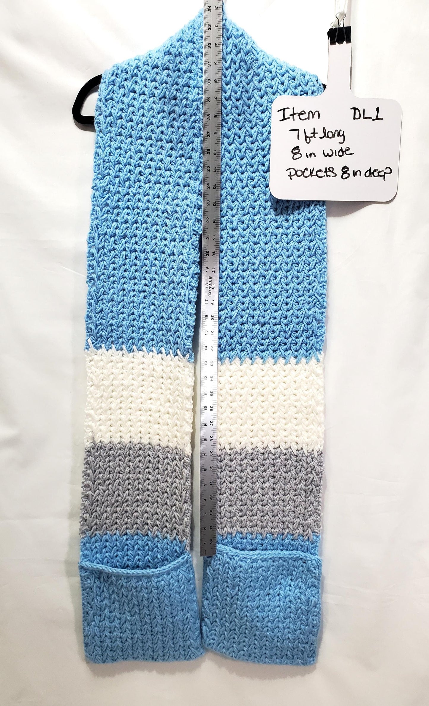 DL1: Detroit Lions Inspired Scarf with Pockets, 7 ft long, 8 in wide, pockets 8 in deep, warm and thick, made with 100% acrylic yarn.