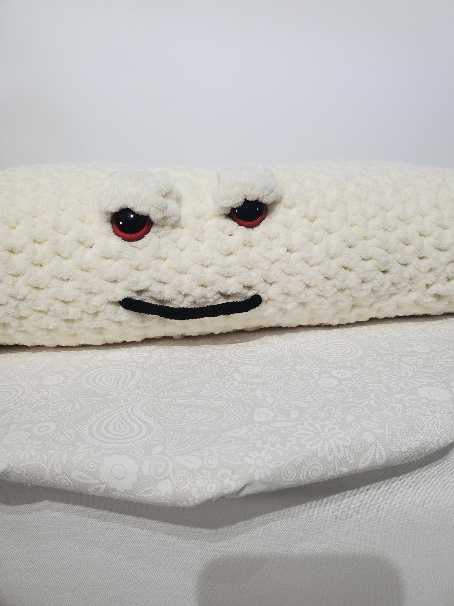 J9 - Crochet Joint / Doobie, White 100% polyester soft blanket yarn, has safety eyes, approx. 22"x 4"