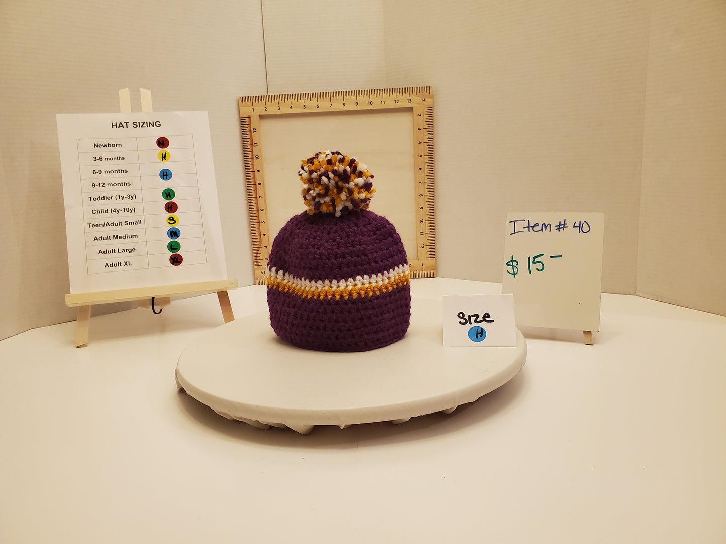 Item #40: MN Vikings Inspired Crochet Beanie With A Pom, Size 6-9 Months, Made From 100% Acrylic Yarn