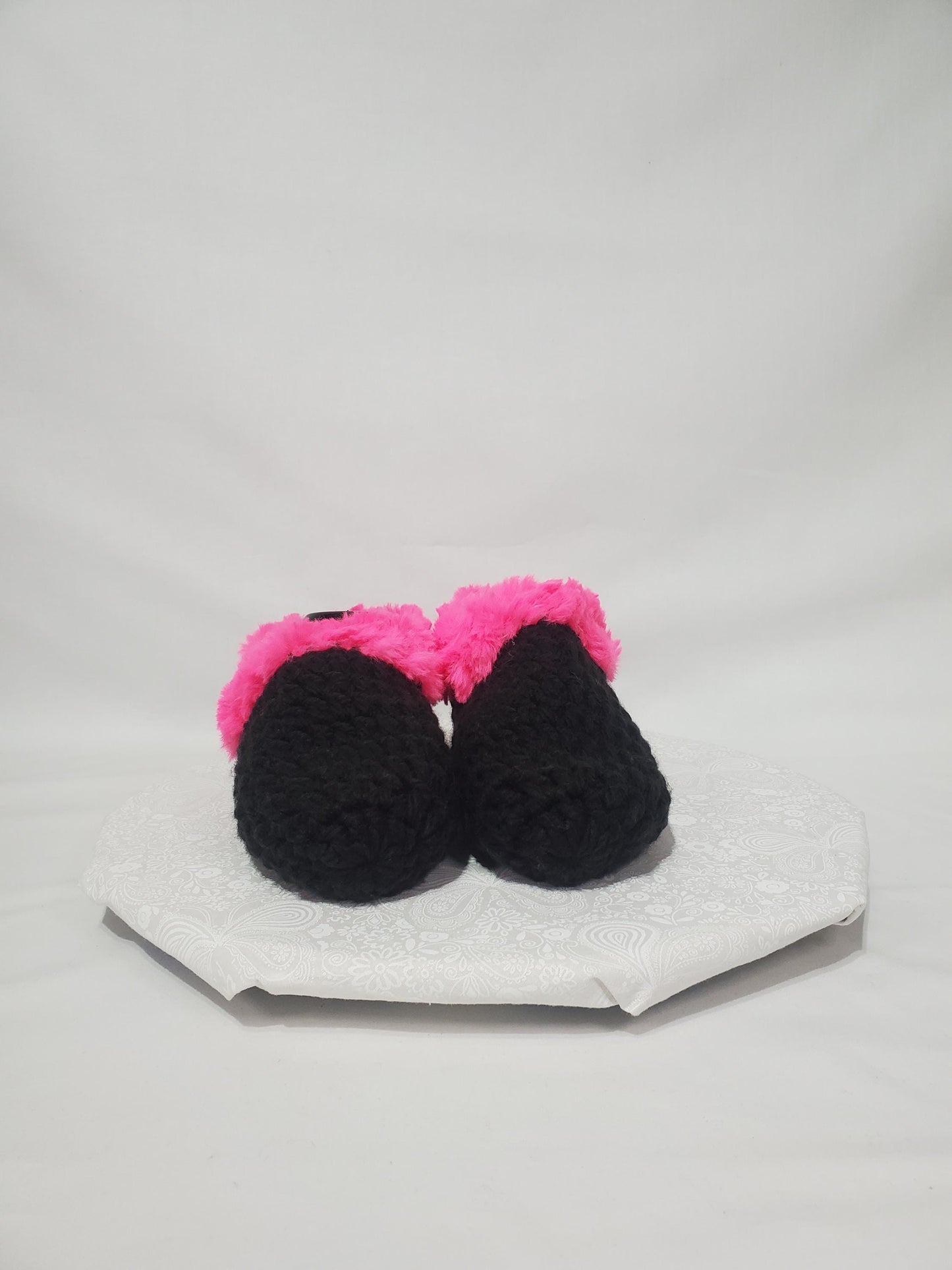 Item S4: Black slippers with pink fur, made with 100% acrylic chunky yarn, Women's size 9/10