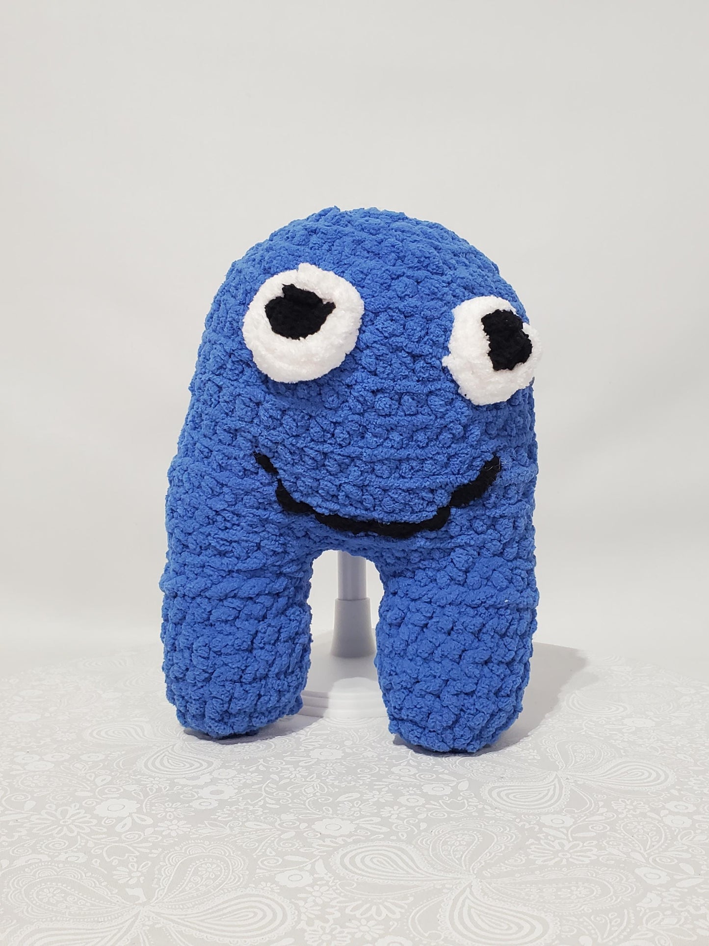 T22: Crochet Monster stuffy/plushy, blue, made with soft blanket yarn (100% Polyester) and safety eyes, approximately 10 inches tall