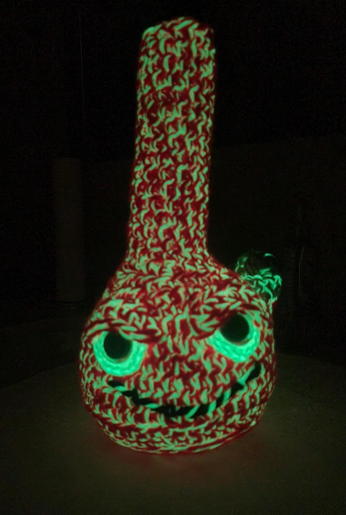 B1: Crochet Bong, Pink and White - GLOWS IN DARK, made with acrylic and cotton yarn, has safety eyes, approx. 10" x 5", 8 oz
