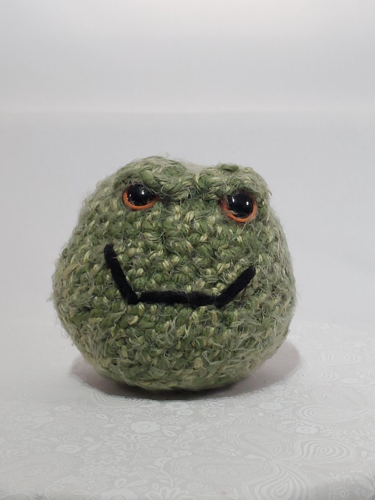 N5: Crochet 420 Nugget, approx. 5x5, made with acrylic and polyester yarn and safety eyes