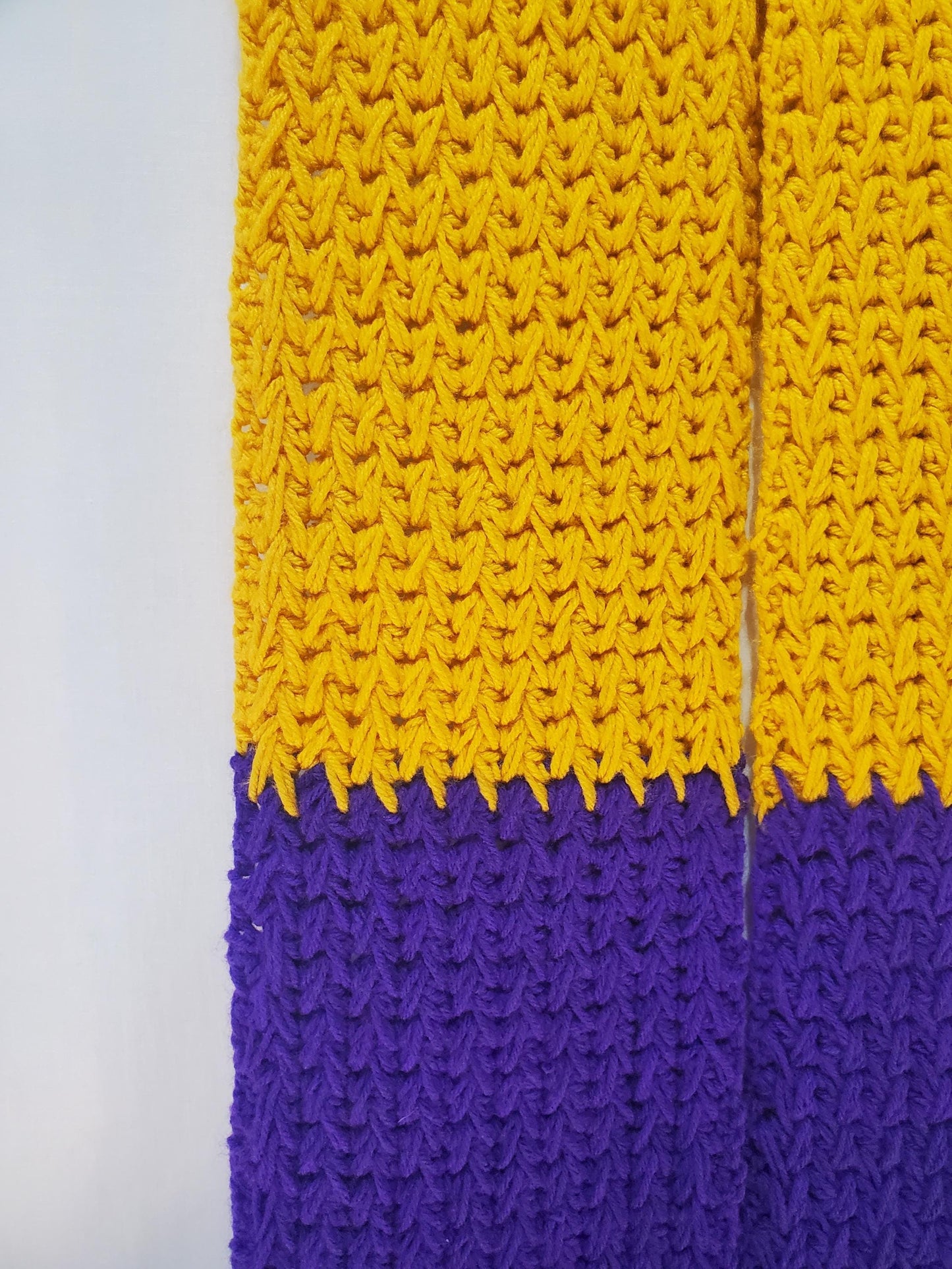 V5: MN Vikings Inspired Scarf with Pockets, 8' long, 7" wide, pockets 9" deep, thick and warm, made with 100% acrylic yarn.