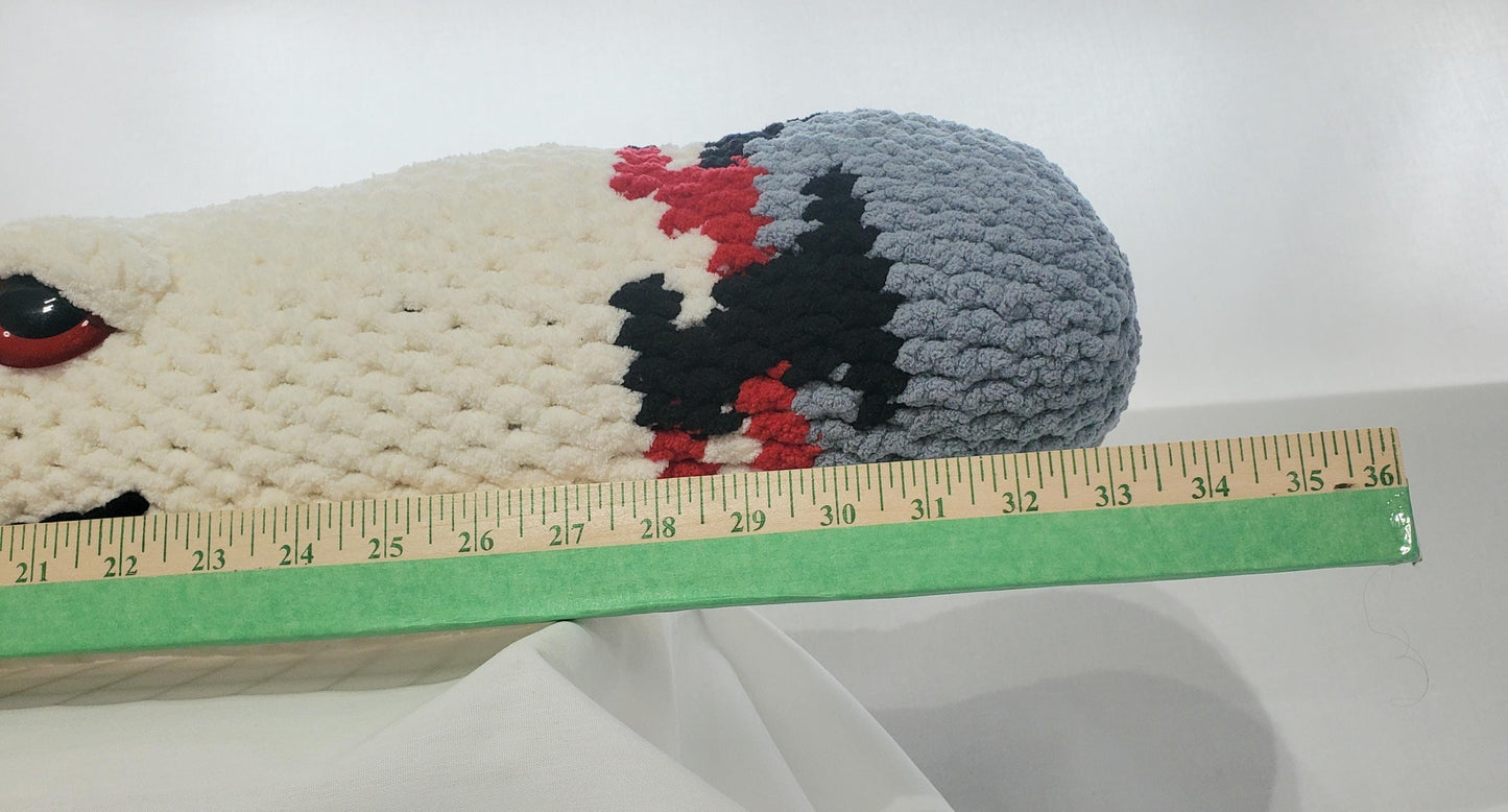 J13 - Crochet Joint / Doobie, White 100% polyester soft blanket yarn, has safety eyes, approx. 32"x 6", 2 lb., 12 oz