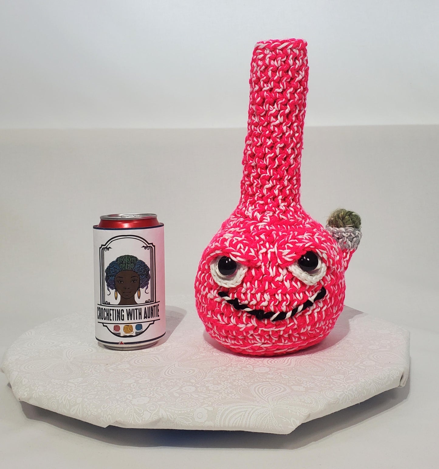 B1: Crochet Bong, Pink and White - GLOWS IN DARK, made with acrylic and cotton yarn, has safety eyes, approx. 10" x 5", 8 oz