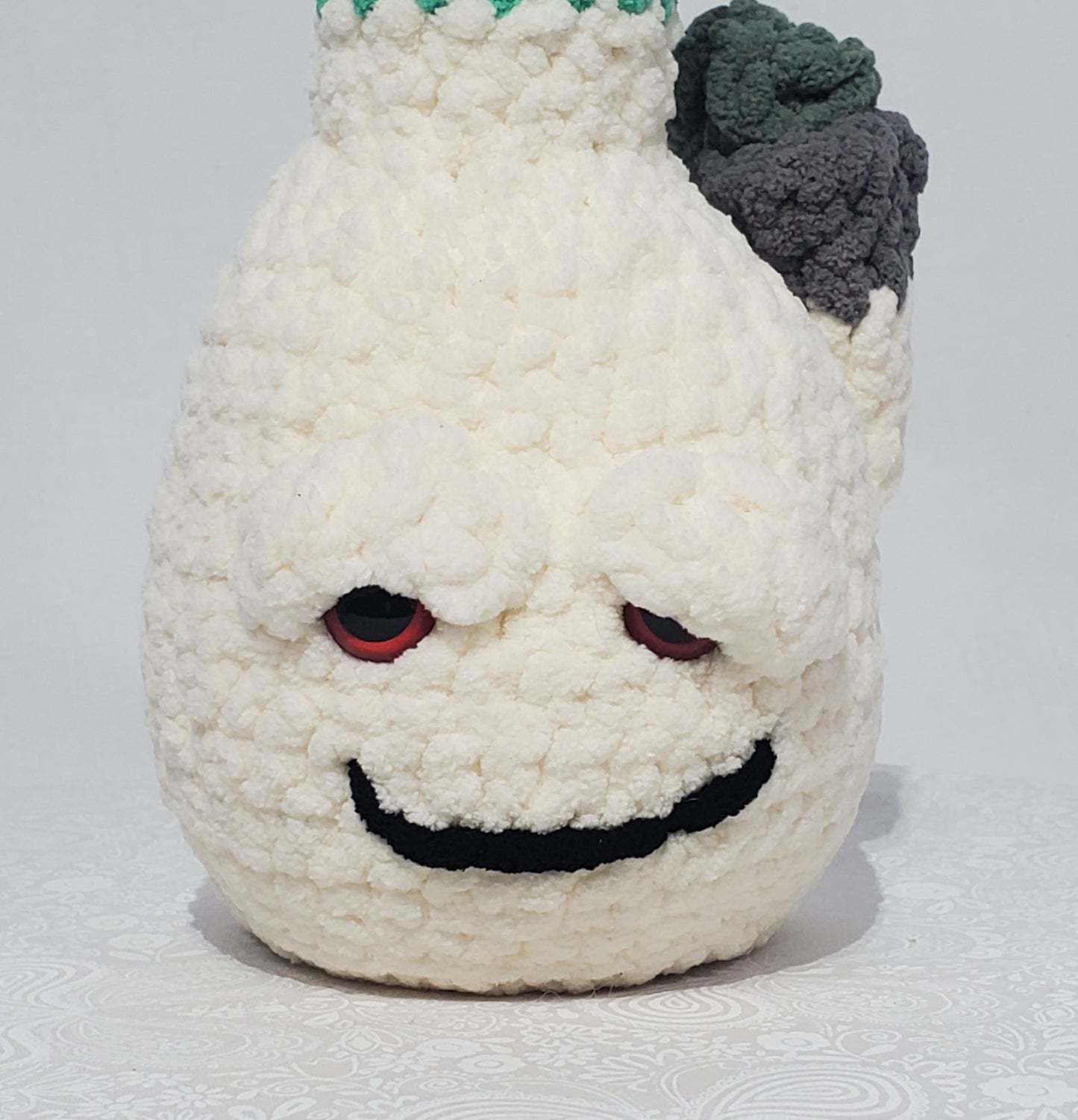 B11: Crochet Bong, White and Teal, made with 100% polyester, soft blanket yarn, has safety eyes, approx. 11" x 4", 7 oz
