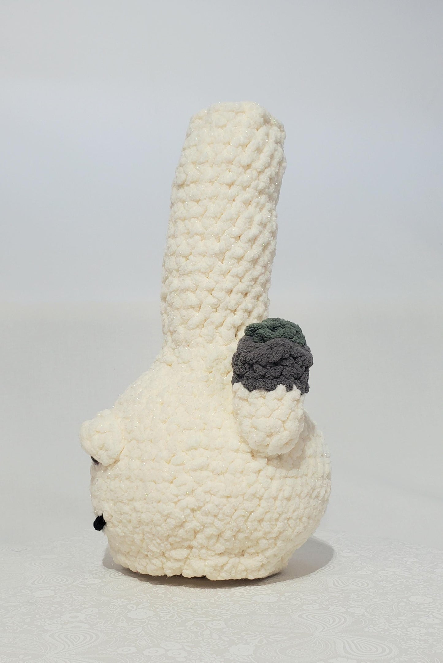 B13: Crochet Bong, Sparkle White, made with 100% polyester, soft blanket yarn, and safety eyes, approx. 12" x 5", 11 oz