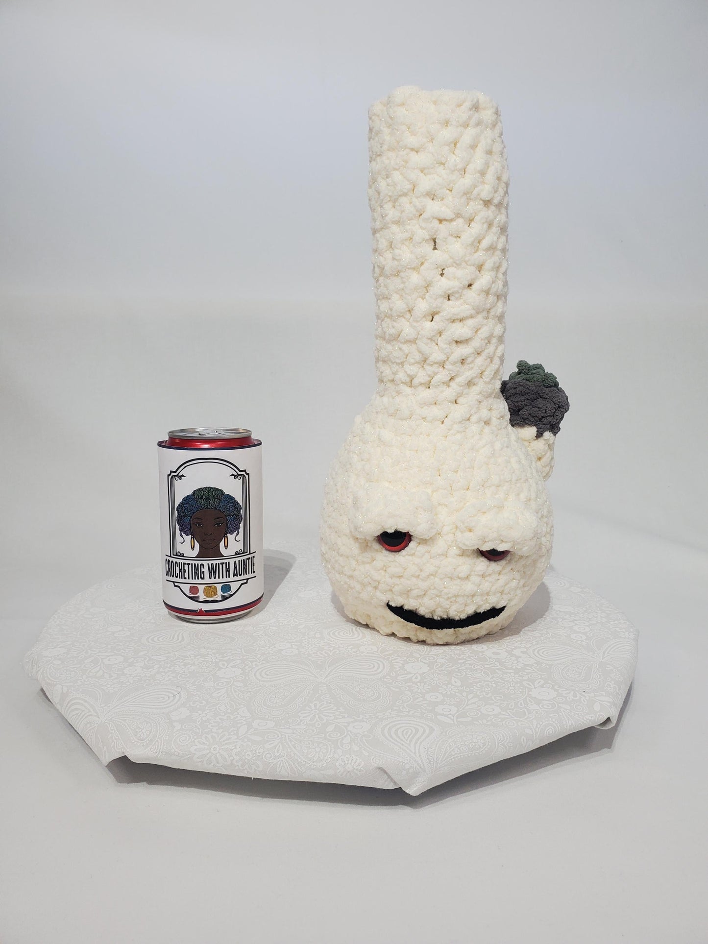 B13: Crochet Bong, Sparkle White, made with 100% polyester, soft blanket yarn, and safety eyes, approx. 12" x 5", 11 oz