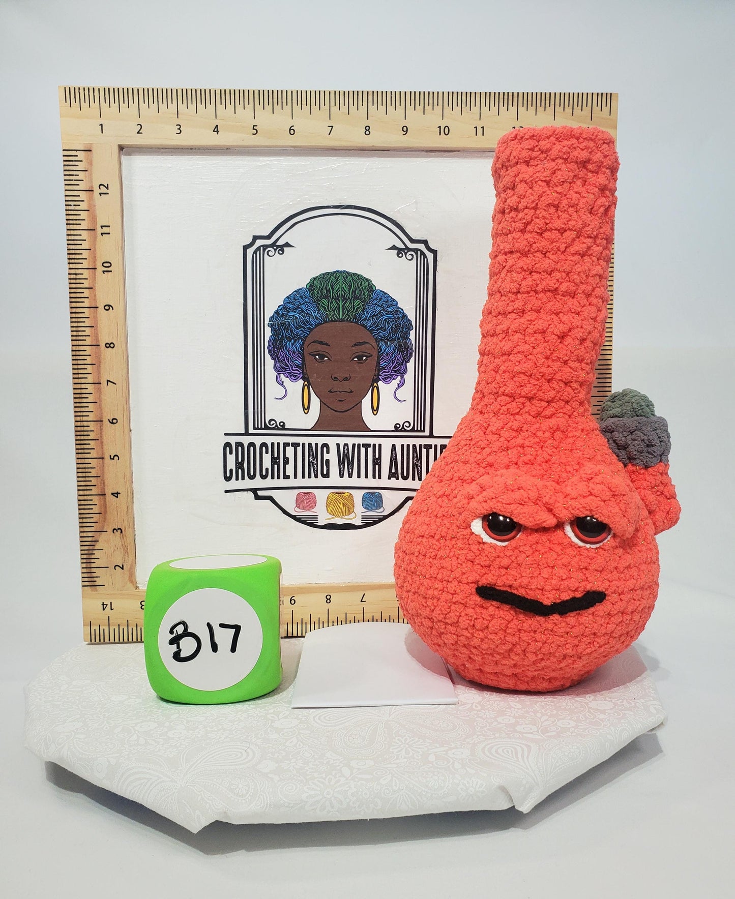 B17: Crochet Bong, Orange, made with soft 100% polyester blanket yarn and safety eyes, approx. 12" x 6", 11 oz