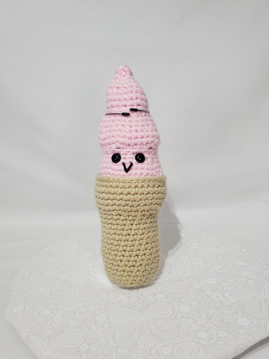 T23: Crochet Swirl Ice Cream Cone, made with 100% acrylic yarn, fiber fill, and plastic safety eyes