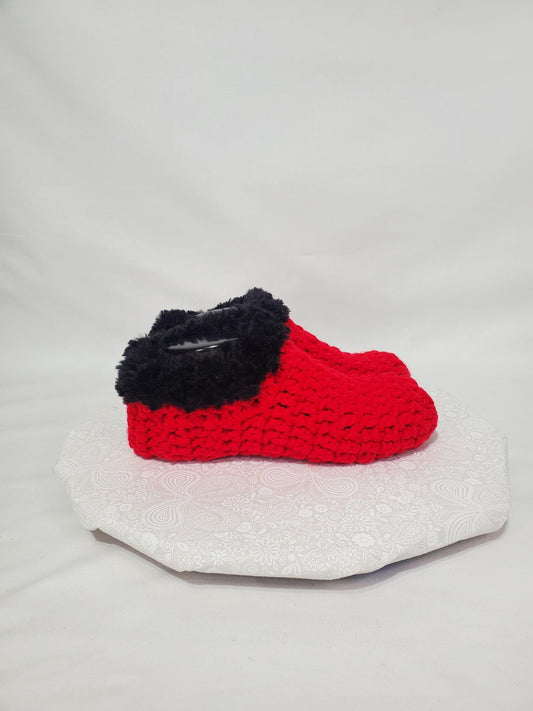 Item S1: Red slippers with black fur, made with 100% acrylic chunky yarn, Women's size 9/10