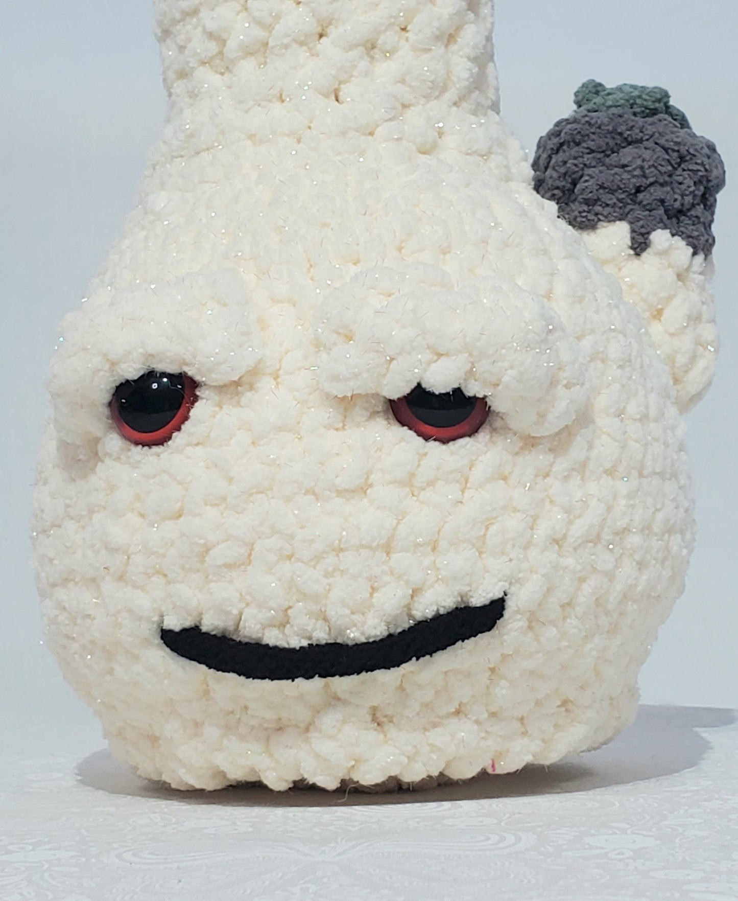 B13: Crochet Bong, Sparkle White, made with 100% polyester, soft blanket yarn, and safety eyes, approx. 12" x 5", 11 oz