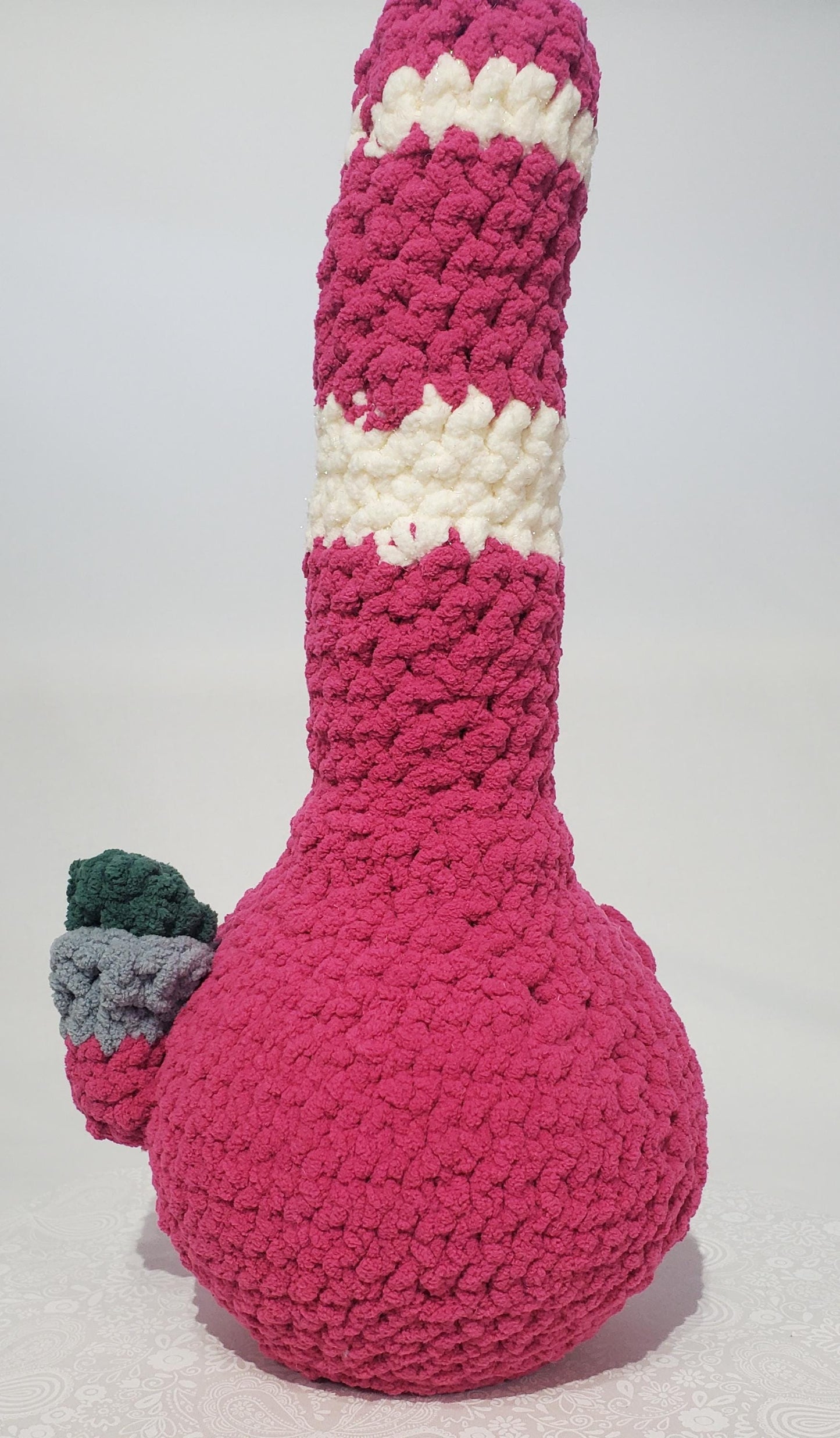 B8: Crochet Bong, Pink and white, made with 100% polyester, soft blanket yarn, and safety eyes, approx. 16" x 7", 13 oz