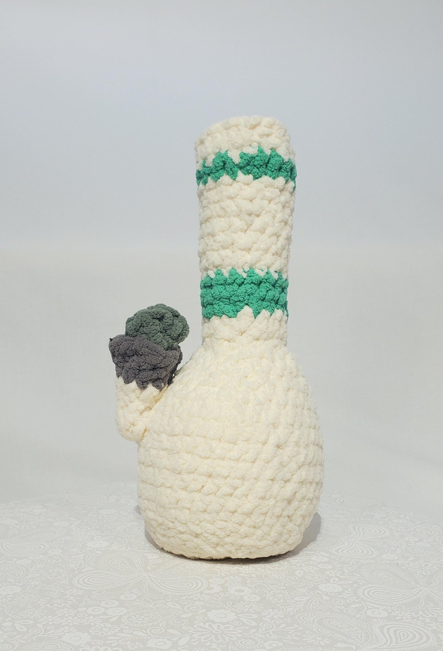 B11: Crochet Bong, White and Teal, made with 100% polyester, soft blanket yarn, has safety eyes, approx. 11" x 4", 7 oz