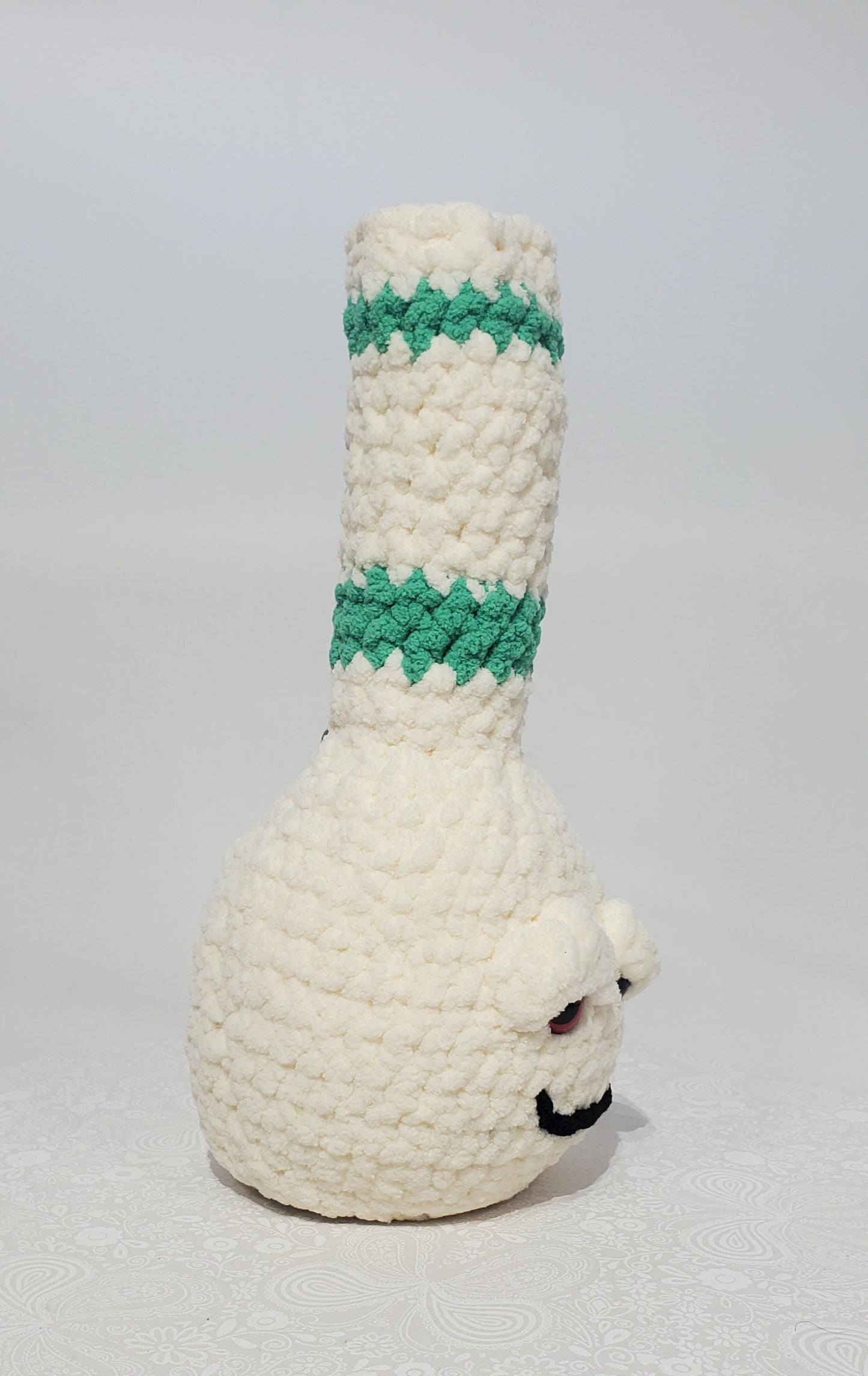 B11: Crochet Bong, White and Teal, made with 100% polyester, soft blanket yarn, has safety eyes, approx. 11" x 4", 7 oz