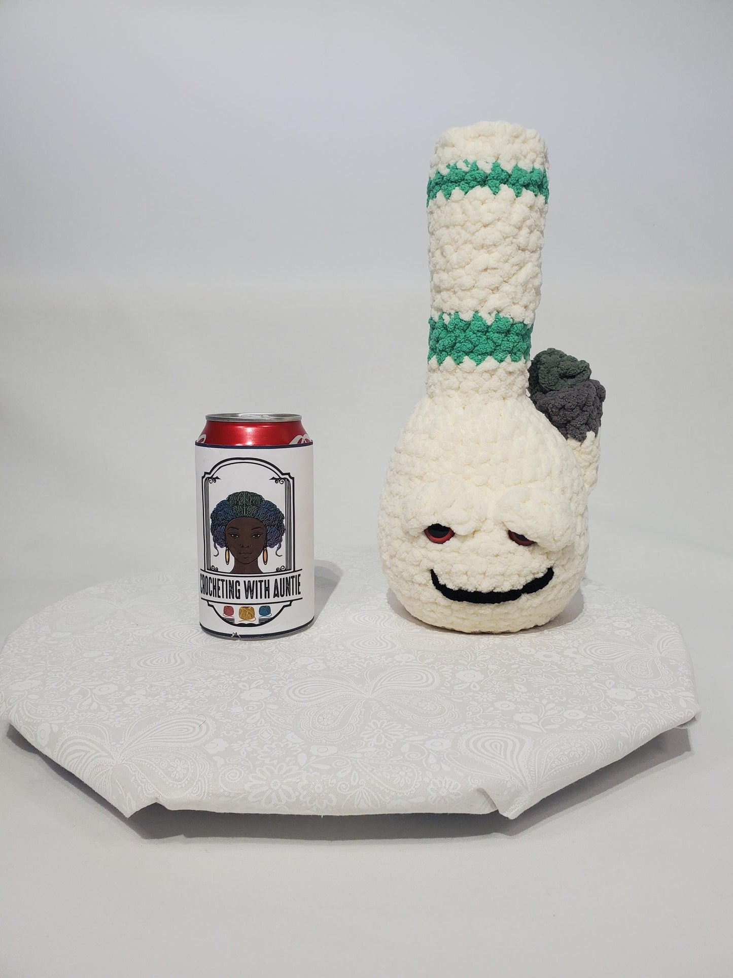 B11: Crochet Bong, White and Teal, made with 100% polyester, soft blanket yarn, has safety eyes, approx. 11" x 4", 7 oz