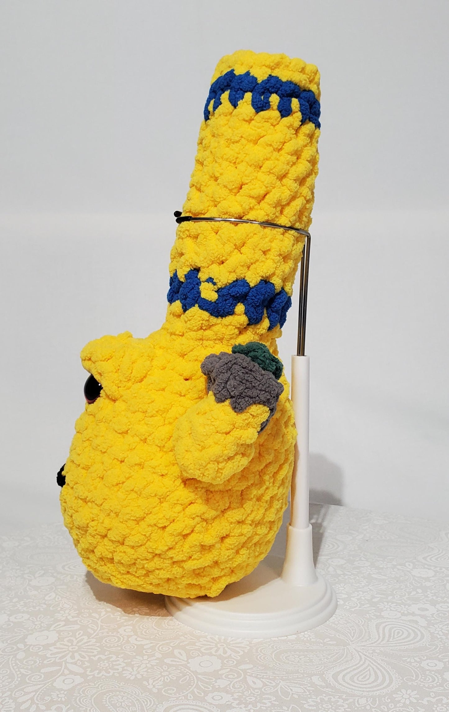 B3: Crochet Bong, yellow and blue, made with 100% polyester, soft blanket yarn, has safety eyes, 10" x 4", 5 oz