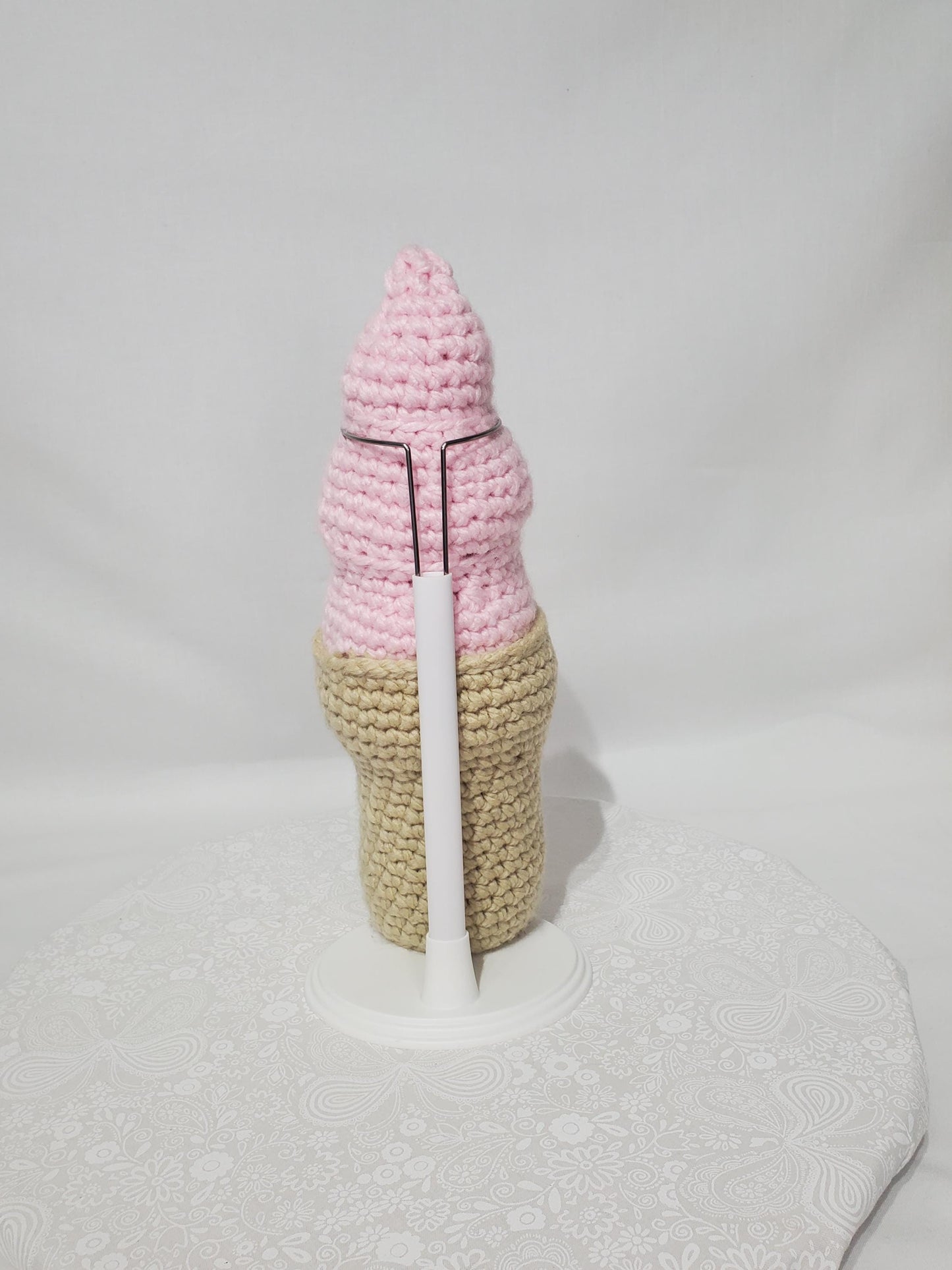 T23: Crochet Swirl Ice Cream Cone, made with 100% acrylic yarn, fiber fill, and plastic safety eyes
