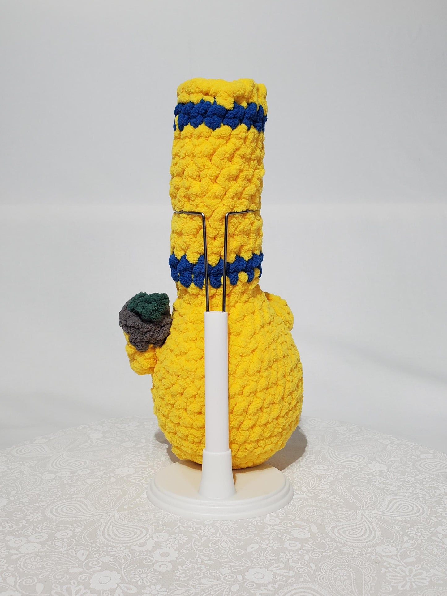 B3: Crochet Bong, yellow and blue, made with 100% polyester, soft blanket yarn, has safety eyes, 10" x 4", 5 oz